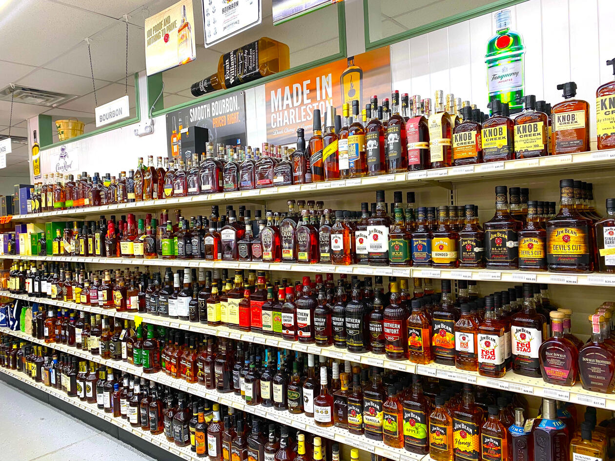 Port City Two Liquors and Wine interior – Wide Selection & Convenient Amenities Bright, organized interior of Port City Two Liquors and Wine in West Ashley, featuring well-stocked shelves of spirits and wine.